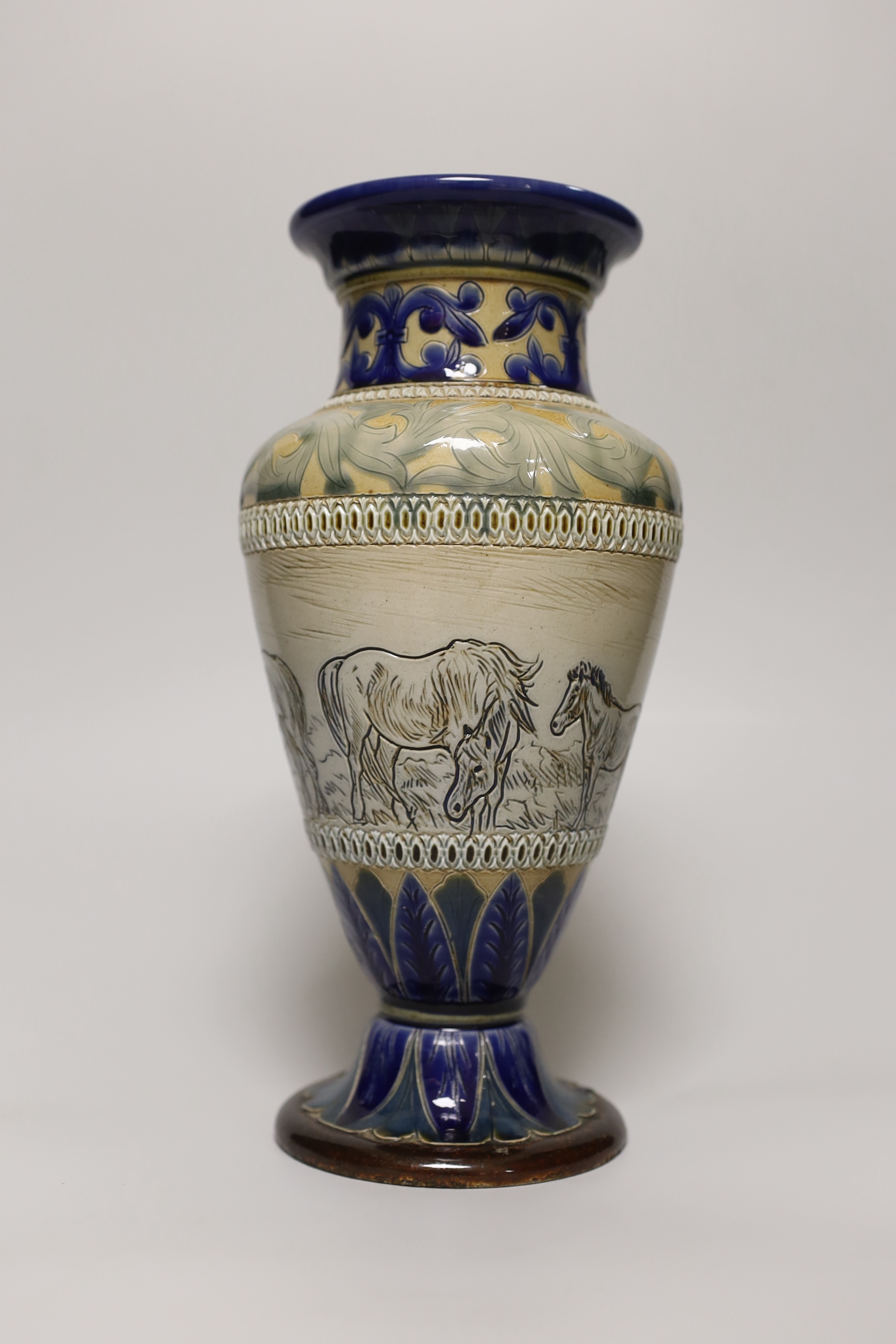 A Hannah Barlow Doulton Lambeth stoneware vase, decorated with horses, stamped and numbered 1883 to the base, 27cm high